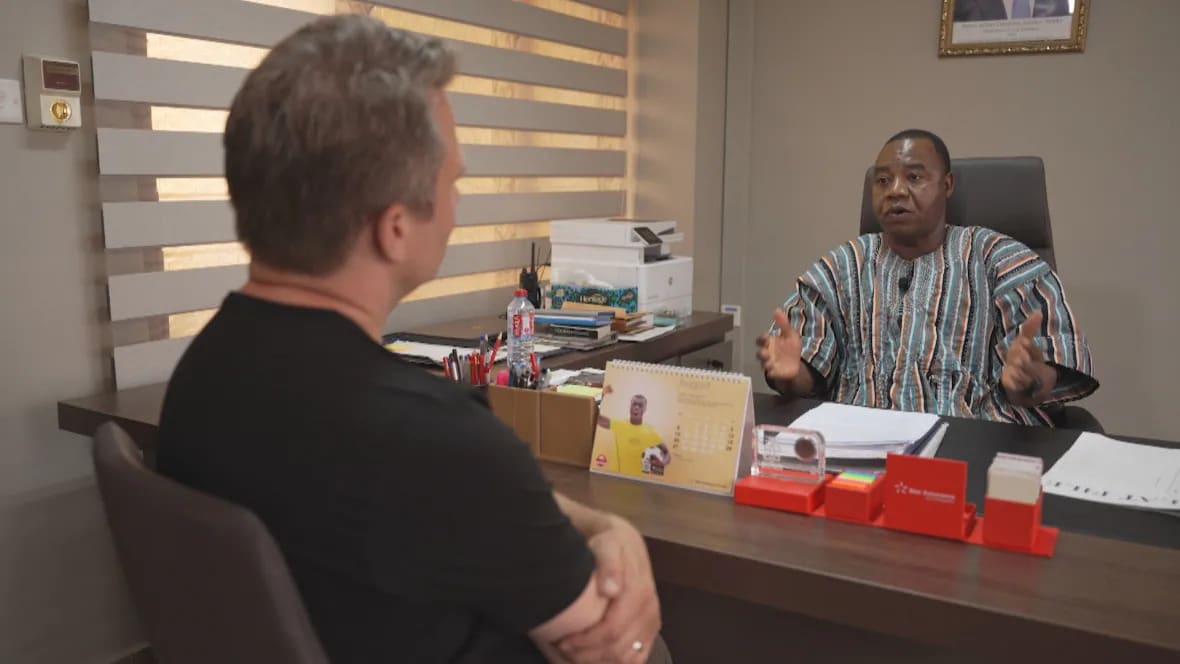 Deputy director of Economic and Organized Crime Office, Abdulai Bashiru Dapilah in an interview with David Common of CBC.(PC: Jared Thomas/CBC)